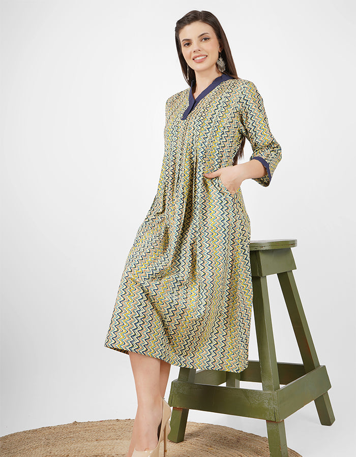 This cotton fit and flare dress is a perfect blend of style and comfort, ideal for summer parties or workwear.
