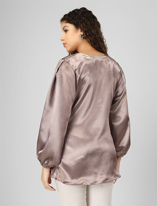 Enhance your wardrobe with this beautiful satin top featuring stylish tucks and full sleeves