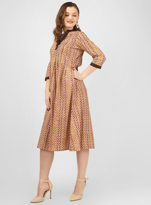 This cotton fit and flare dress is a perfect blend of style and comfort, ideal for summer parties or workwear.