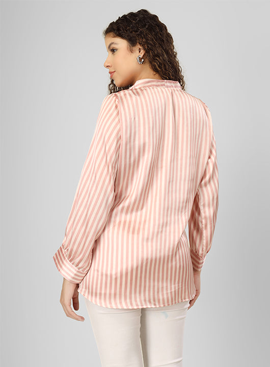 Embrace effortless elegance with this stylish striped kurti adorned with delicate pearl detailing