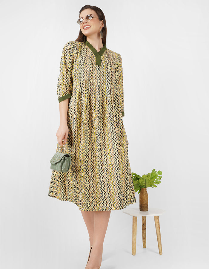 This cotton fit and flare dress is a perfect blend of style and comfort, ideal for summer parties or workwear.