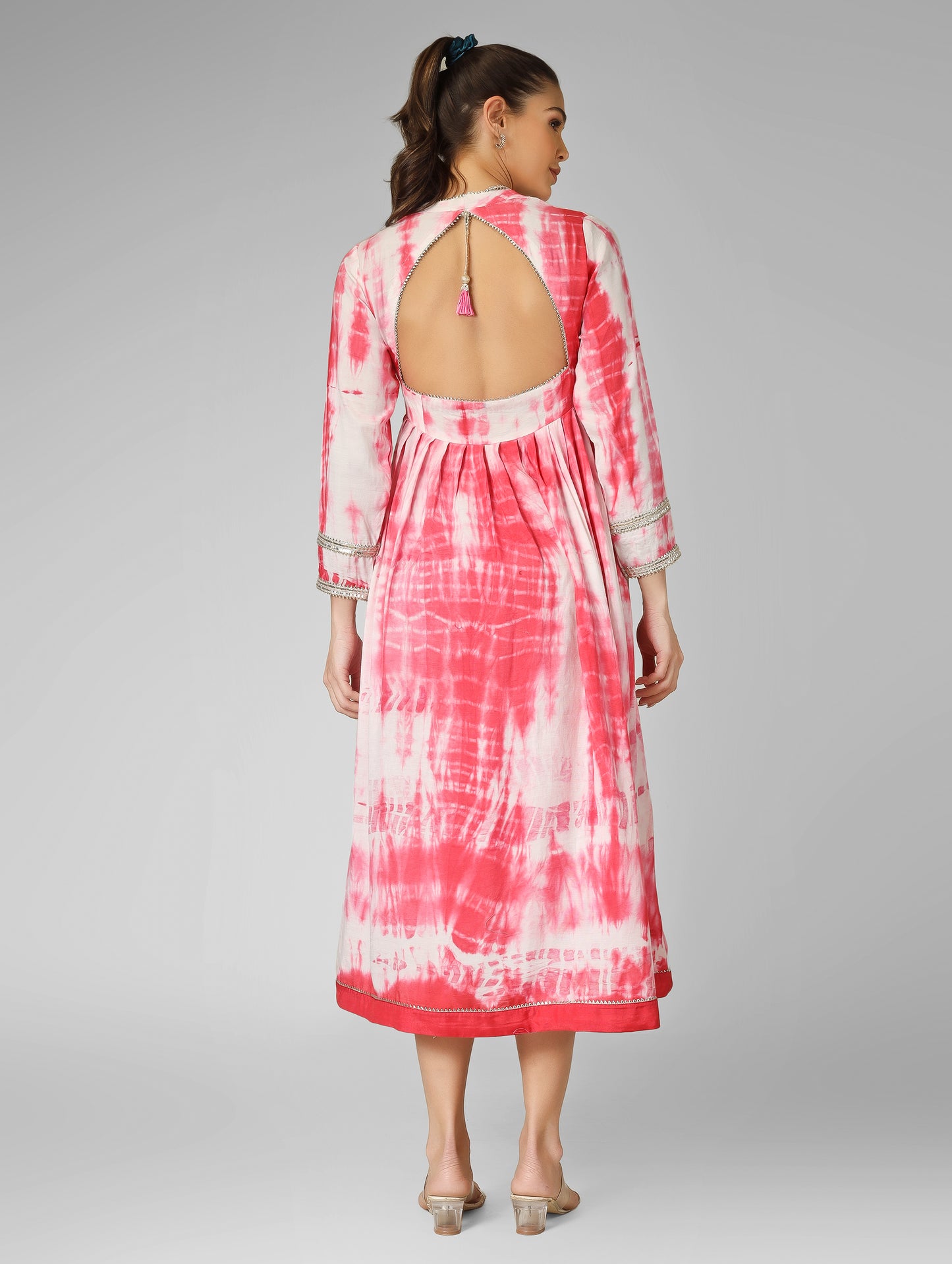 Drape yourself in festival magic — our Tie-Dye Dream floor-length backless dress flows like liquid sunset. Effortlessly elegant, bold, and unforgettable