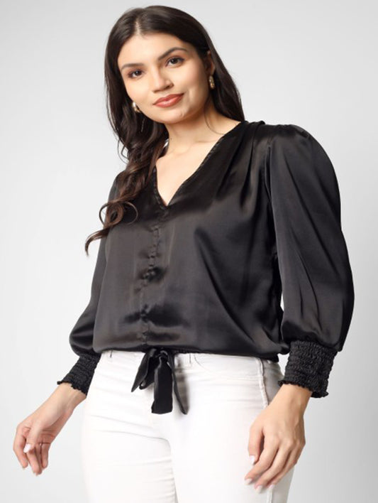 This solid black satin top with full sleeves and a stylish knot detailing at the hem is a perfect pick for party nights.
