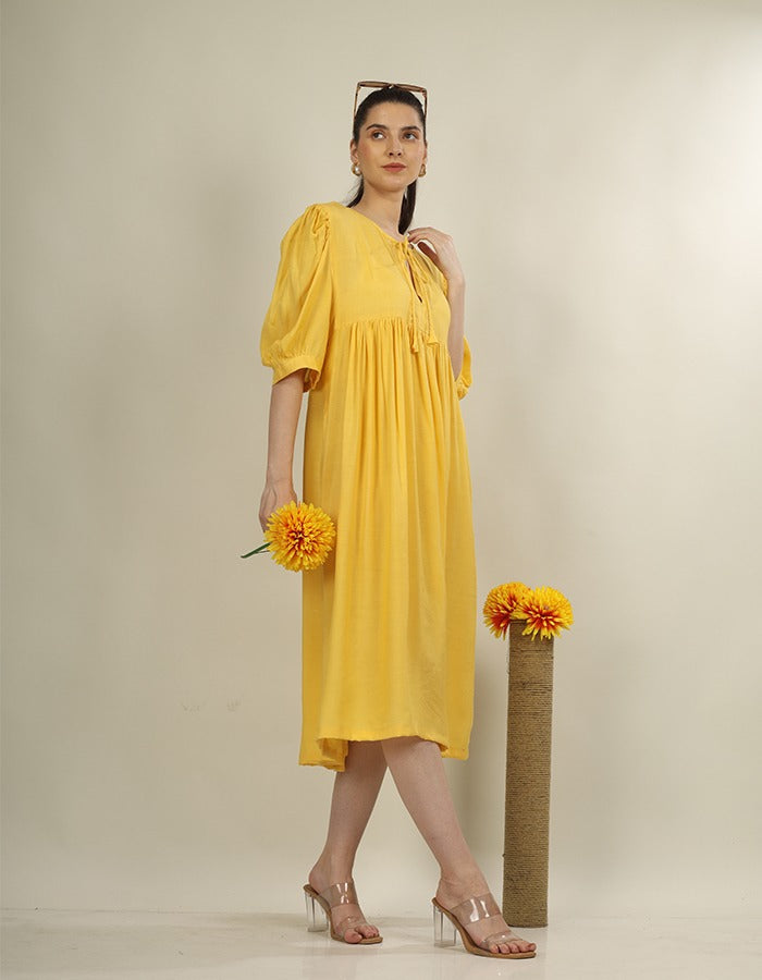 Bright yellow dress yoke dress and puff sleeves is perfect summer wear dress