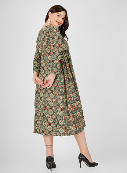 Embrace the beauty of summer with this Cotton Floral Print Dress, featuring a charming dori tie neckline and side pleated detailing for a flattering silhouette.