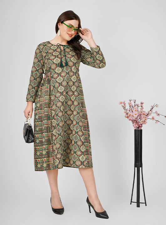 Embrace the beauty of summer with this Cotton Floral Print Dress, featuring a charming dori tie neckline and side pleated detailing for a flattering silhouette.