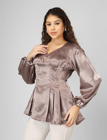 Enhance your wardrobe with this beautiful satin top featuring stylish tucks and full sleeves