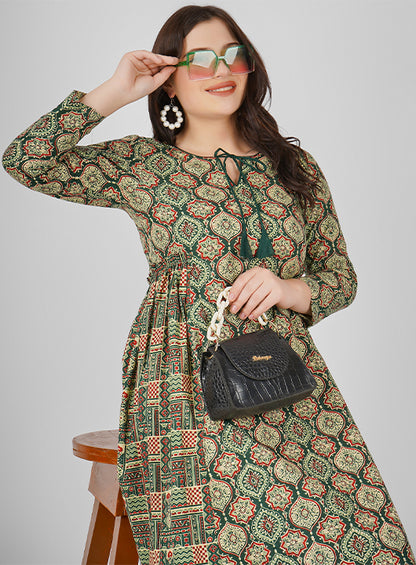 Embrace the beauty of summer with this Cotton Floral Print Dress, featuring a charming dori tie neckline and side pleated detailing for a flattering silhouette.