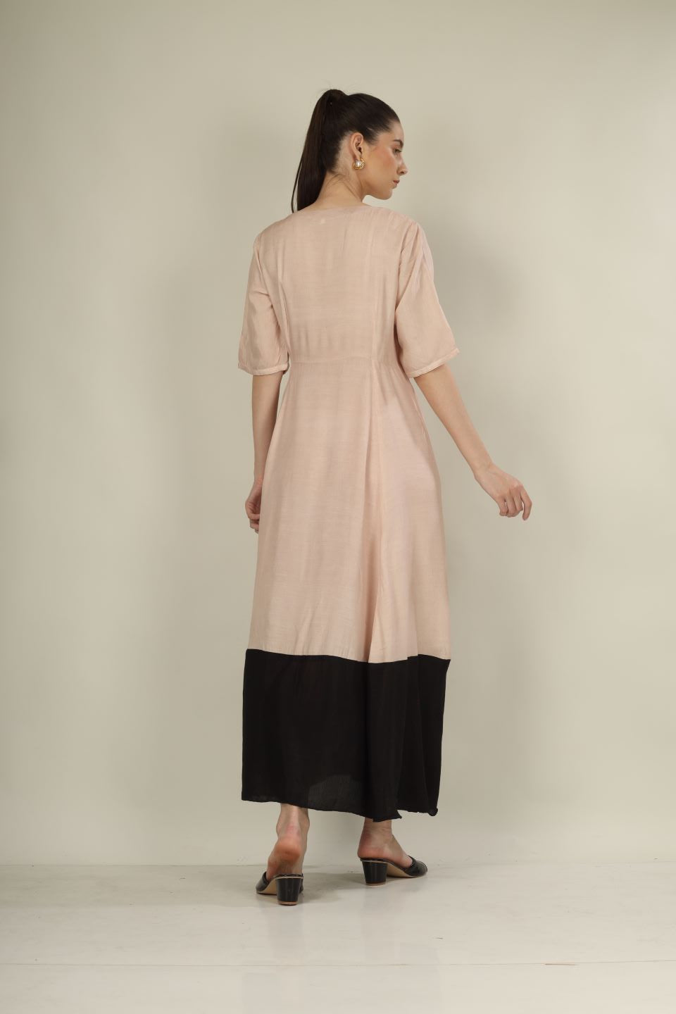 "Chic Beige & Black Overlap Dress with Knot Detail – Perfect for Parties & Formal Events"