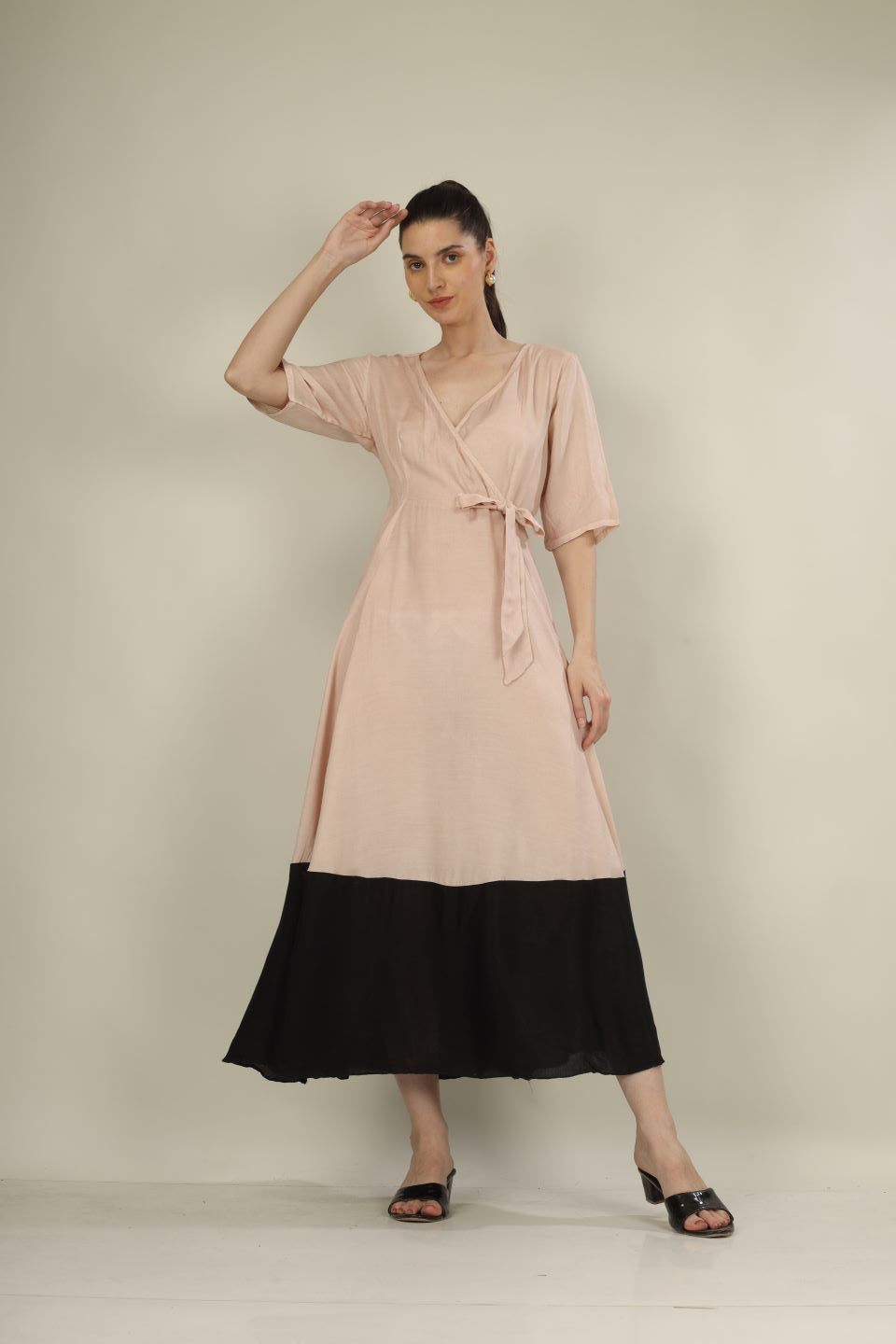 "Chic Beige & Black Overlap Dress with Knot Detail – Perfect for Parties & Formal Events"