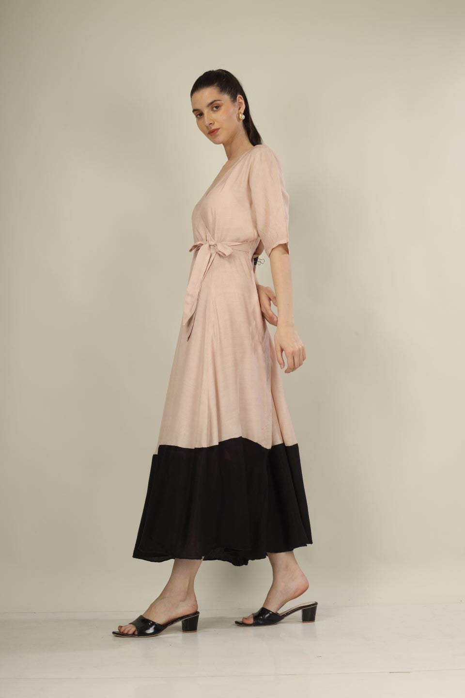 "Chic Beige & Black Overlap Dress with Knot Detail – Perfect for Parties & Formal Events"