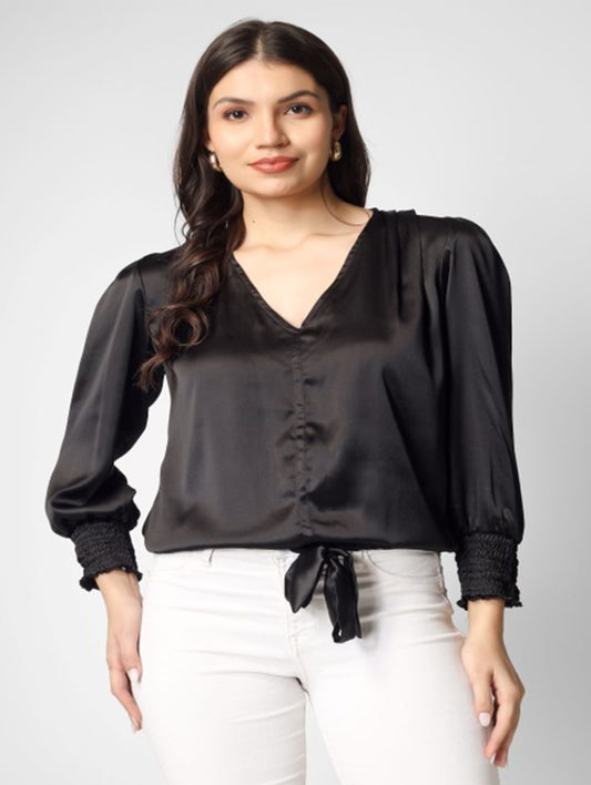 This solid black satin top with full sleeves and a stylish knot detailing at the hem is a perfect pick for party nights.