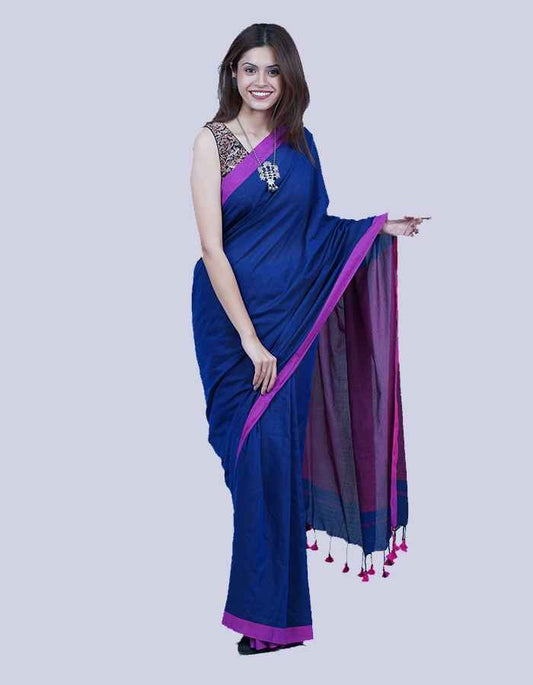 Linen purple saree with Magenda pink pallu and teseels on the pallu