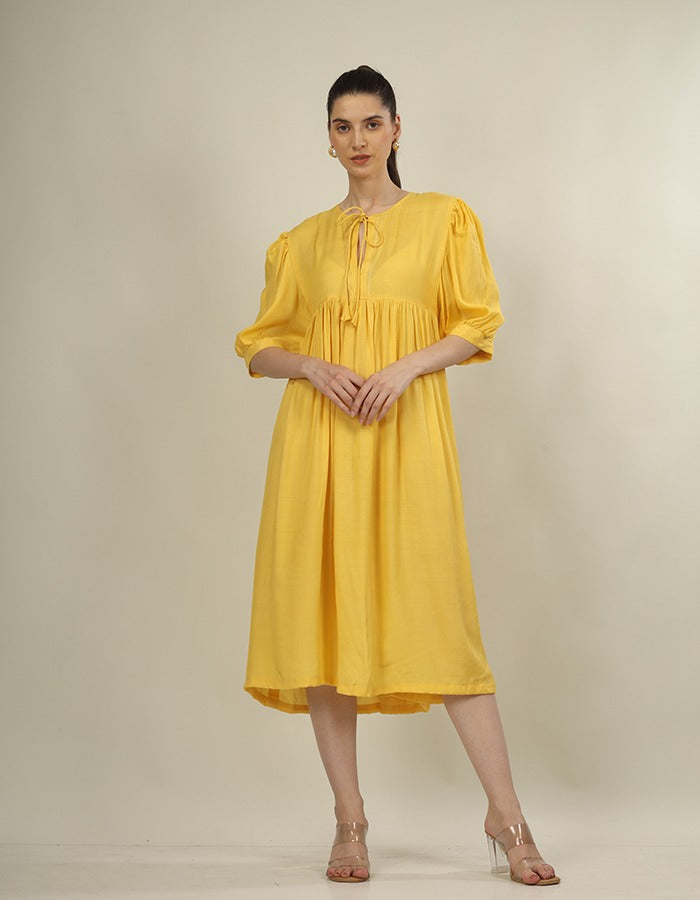 Bright yellow dress yoke dress and puff sleeves is perfect summer wear dress
