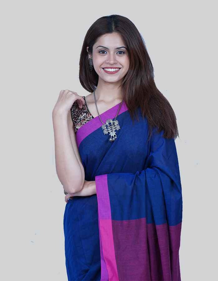 Linen purple saree with Magenda pink pallu and teseels on the pallu