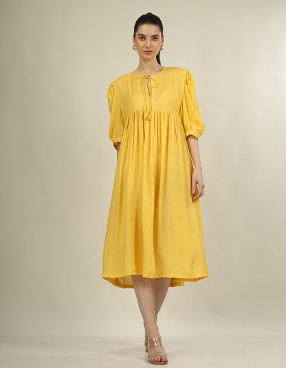Bright yellow dress yoke dress and puff sleeves is perfect summer wear dress
