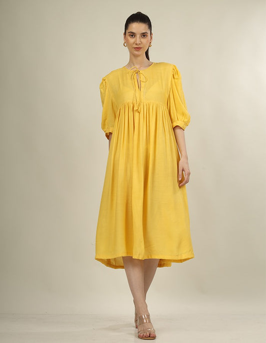 Bright yellow dress yoke dress and puff sleeves is perfect summer wear dress