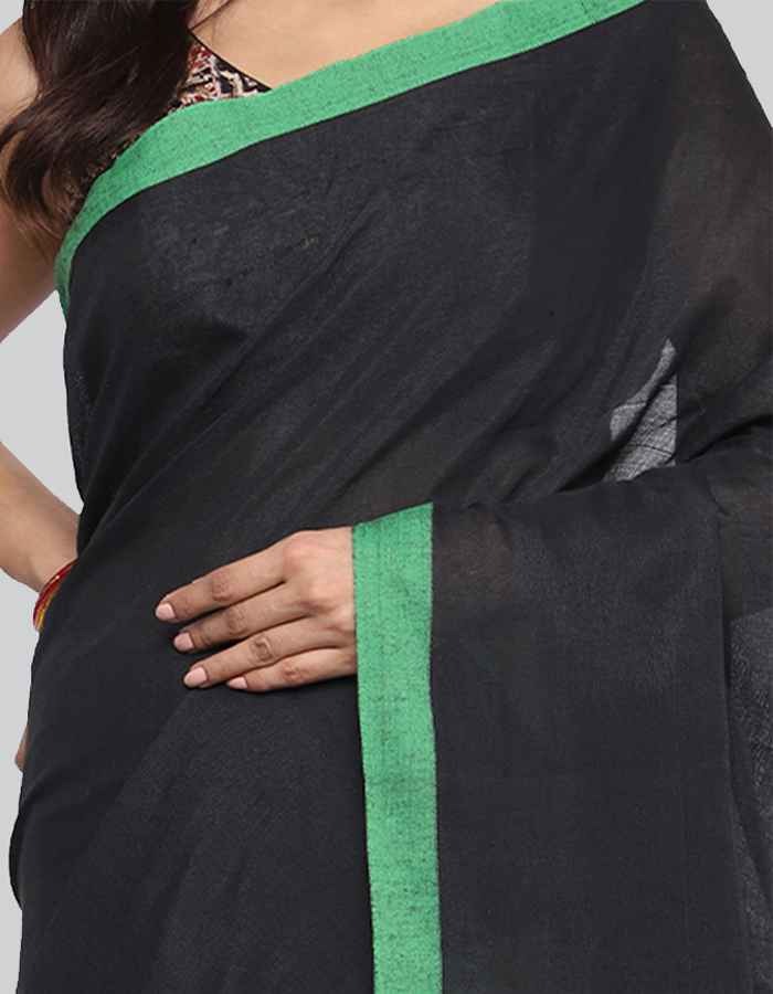 Linen Black saree with embroidery on pallu.This Black saree has green border and green pallu