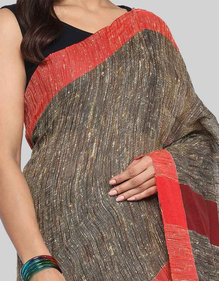 Gitcha Silk dark beige with red border saree with tessel is perfect work wear saree .