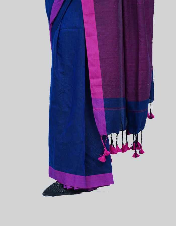 Linen purple saree with Magenda pink pallu and teseels on the pallu