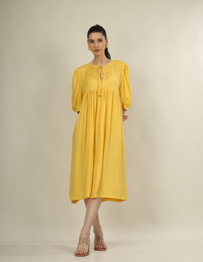 Bright yellow dress yoke dress and puff sleeves is perfect summer wear dress
