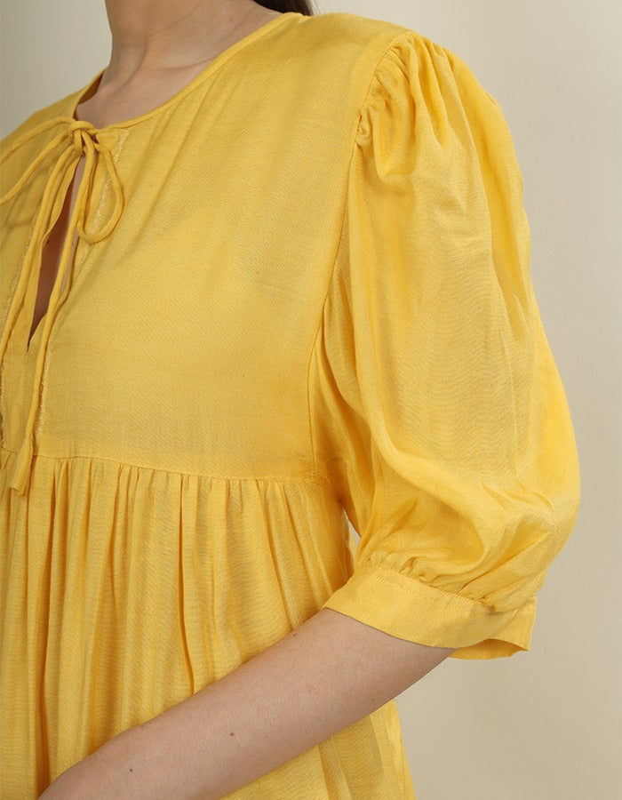 Bright yellow dress yoke dress and puff sleeves is perfect summer wear dress