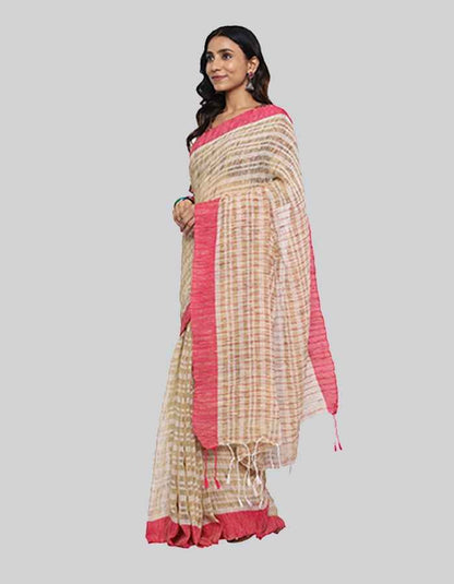 Offwhite saree with pink border and slub texture is perfect workwear and evening wear.