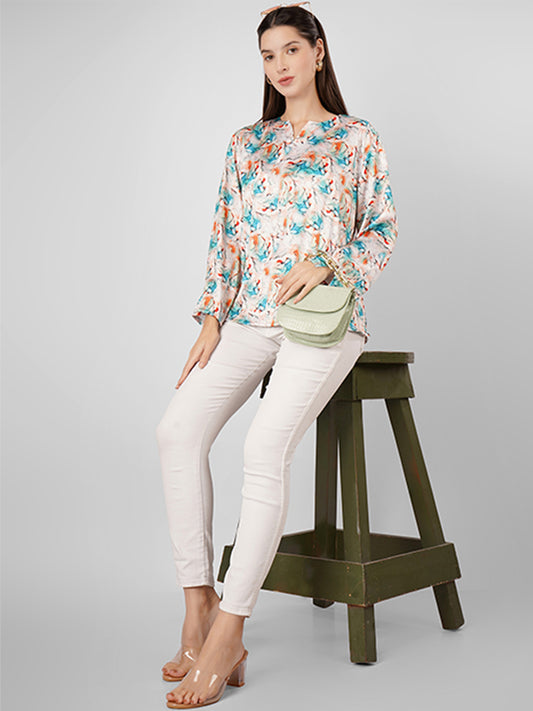 This V-neck printed satin top with full sleeves is the perfect blend of style and versatility
